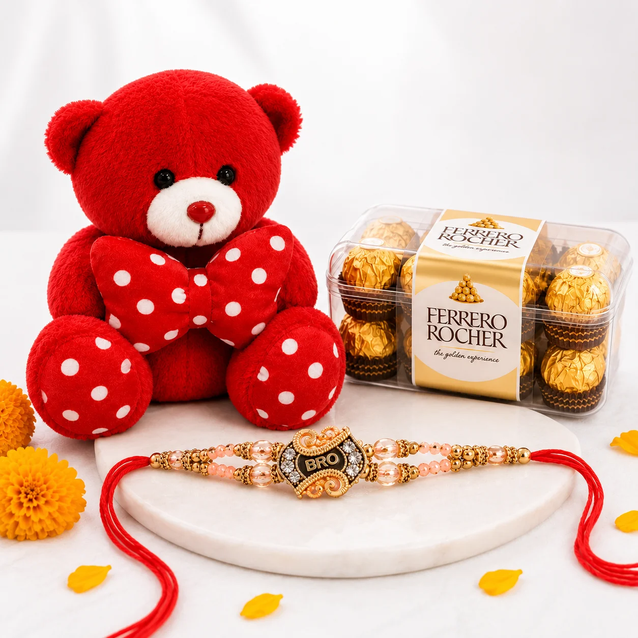 Teddy, Ferrero & Bro Rakhi Gift Box featuring a soft teddy bear, 16 Ferrero Rocher chocolates and a stylish Bro rakhi